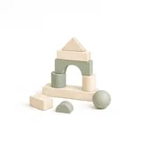 A set of wooden blocks part-built into an arch and gable, with a sphere, a half-round and a loose rectangular block on the floor beside it